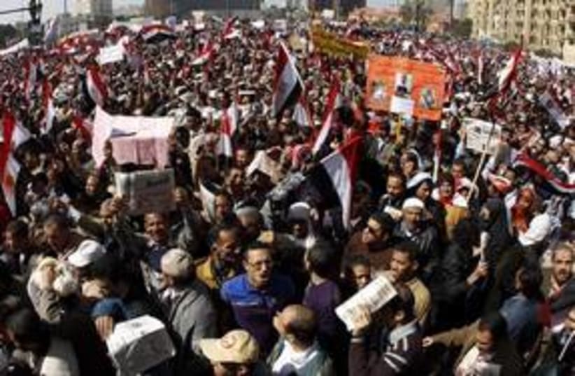 Pro-democracy protesters gather in Tahrir Square 311 Reut (photo credit: Peter Andrews / Reuters)