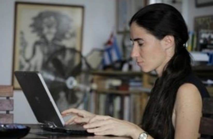woman on laptop (photo credit: REUTERS/Desmond Boylan)