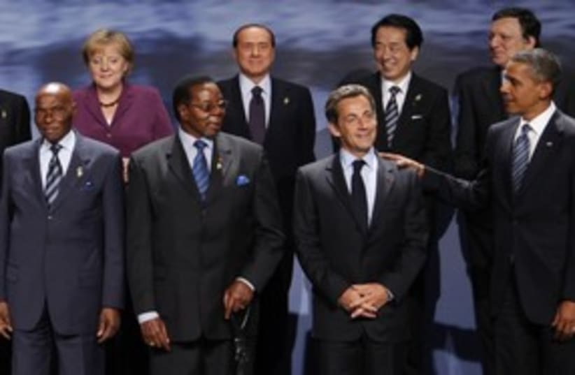G8 group photo (R) 311 (photo credit: Reuters / Images)