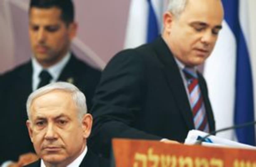 PM Netanyahu and Finance Minister Yuval Steinitz 311 (R) (photo credit: REUTERS)