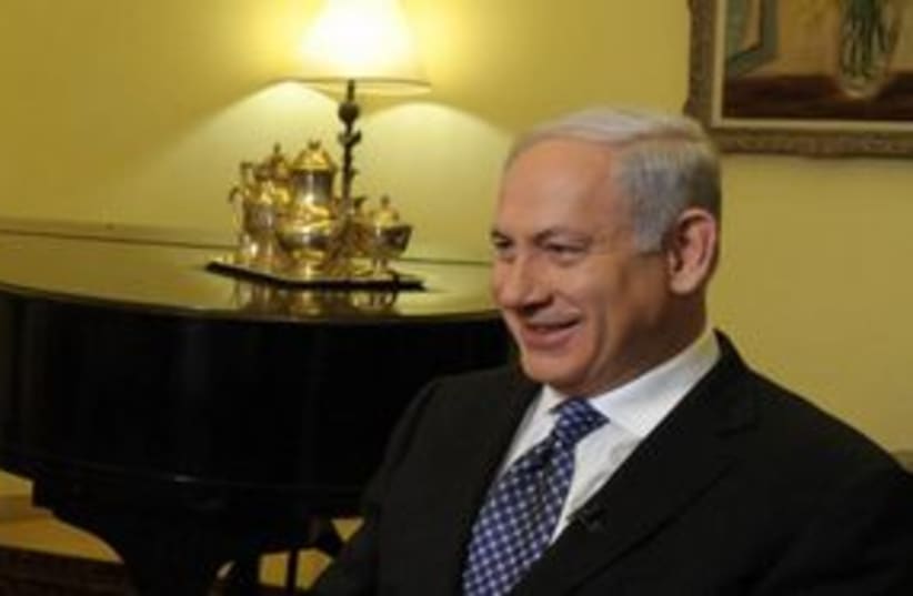 Netanyahu smiling 311 (photo credit: Amos Ben Gershom/GPO)