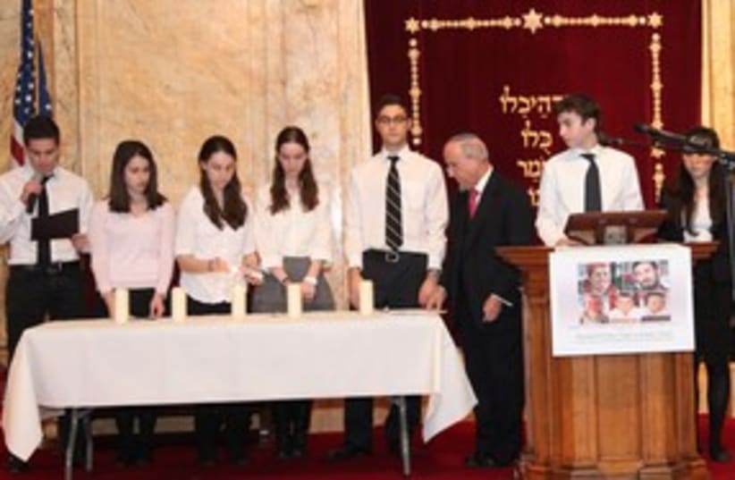 Rabbi Haskel Lookstein and students light candles 311 (photo credit: Courtesy Council of Presidents)