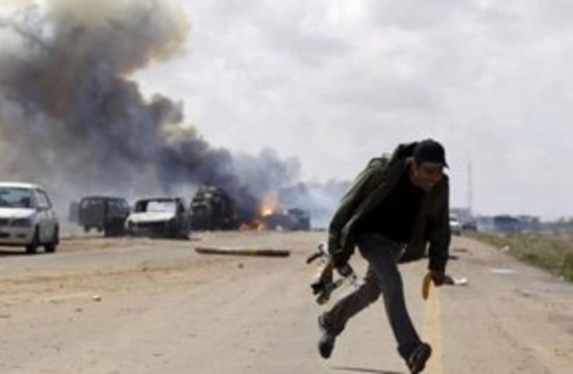 Libya bombing 311 (photo credit: REUTERS/Goran Tomasevic)