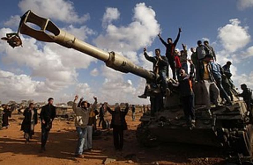 libya tank celebration 311 (photo credit: REUTERS)