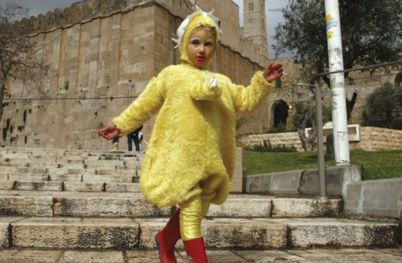 Purim in Hebron  (photo credit: reuters)