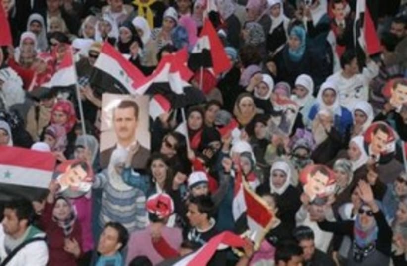 Supporters of Syrian President Assad in Aleppo 311 (R) (photo credit: REUTERS/George Ourfalian)