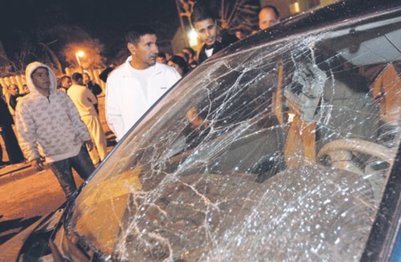 Rocket attack damage car windshield  521 (R) (photo credit: Reuters)