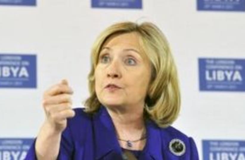 Hilary Clinton Libya background 311 (photo credit: REUTERS/Toby Melville)