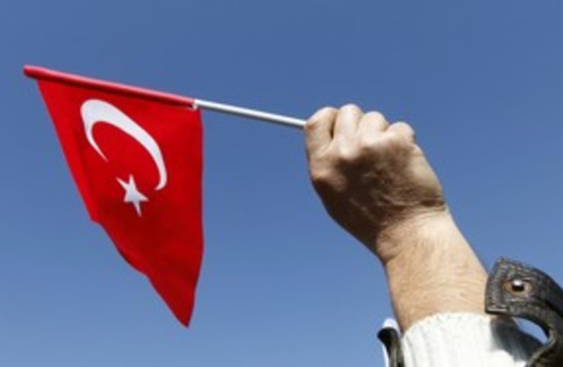 Turkish flag 311 (R) (photo credit: Osman Orsal / Reuters)