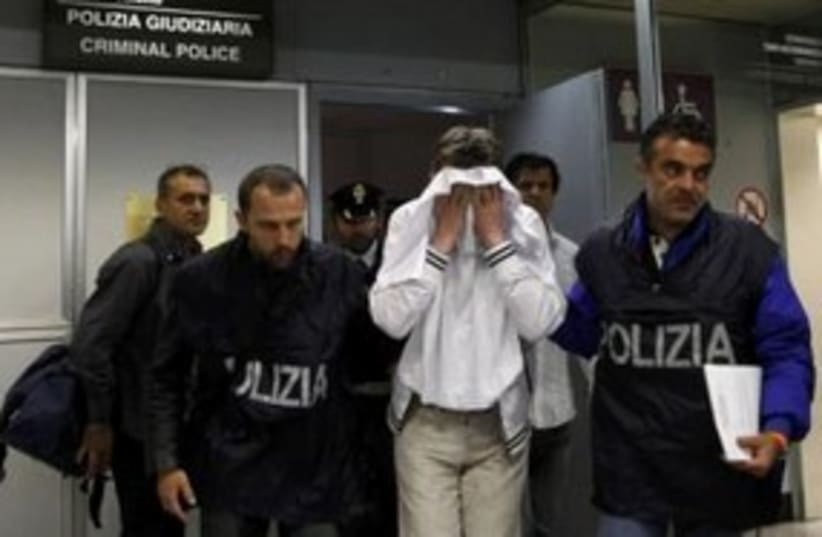Would-be hijacker of Alitalia flight in police custody 311 R (photo credit: REUTERS/Alessandro Bianchi)
