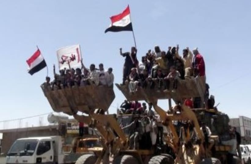 Yemen protests bulldozer 311 (photo credit: REUTERS)