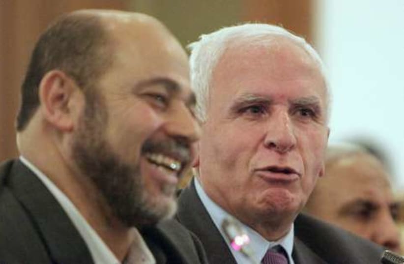 Fatah Hamas reconciliation 521 (photo credit: REUTERS/Asmaa Waguih)