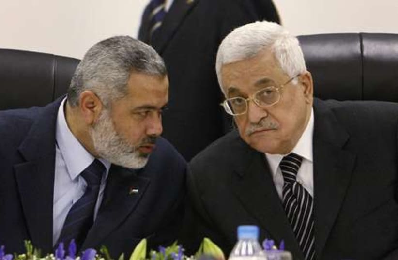 Haniyeh  and Abbas 521 (photo credit: REUTERS)