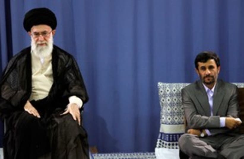 Iranian Supreme Leader Khamenei and Ahmadinejad 311 (R) (photo credit: Reuters)