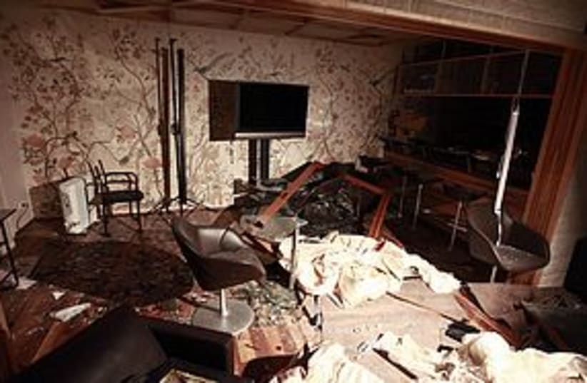 gaddafi home damage 311 (photo credit: REUTERS)