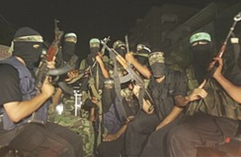 Hamas gunmen at a march in Rafah (photo credit: AP)