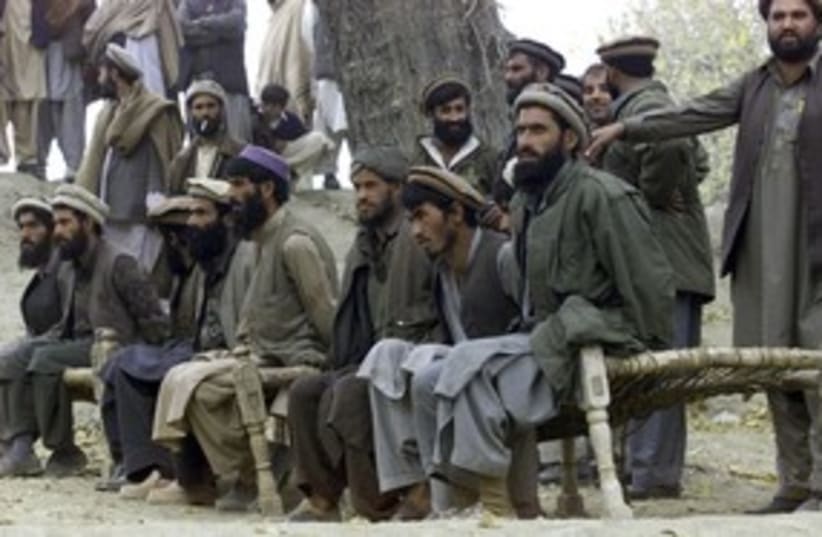 Captured Afghan al Qaeda members 311 R (photo credit: Reuters [file])