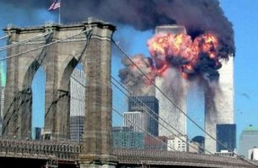 World Trade Center on September 11, 2001 (R) (photo credit: REUTERS/Sara K. Schwittek)