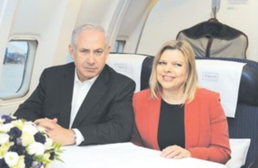 PM Netanyahu and wife Sarah headed to London 311 (photo credit: Amos Ben-Gershom/GPO)