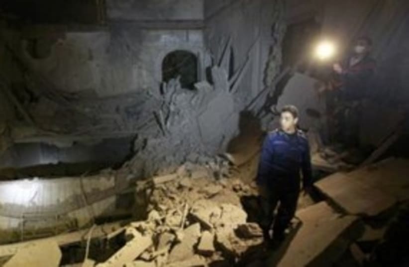 A Libyan building damaged from NATO airstrikes 311 (R) (photo credit: REUTERS/Louafi Larbi)