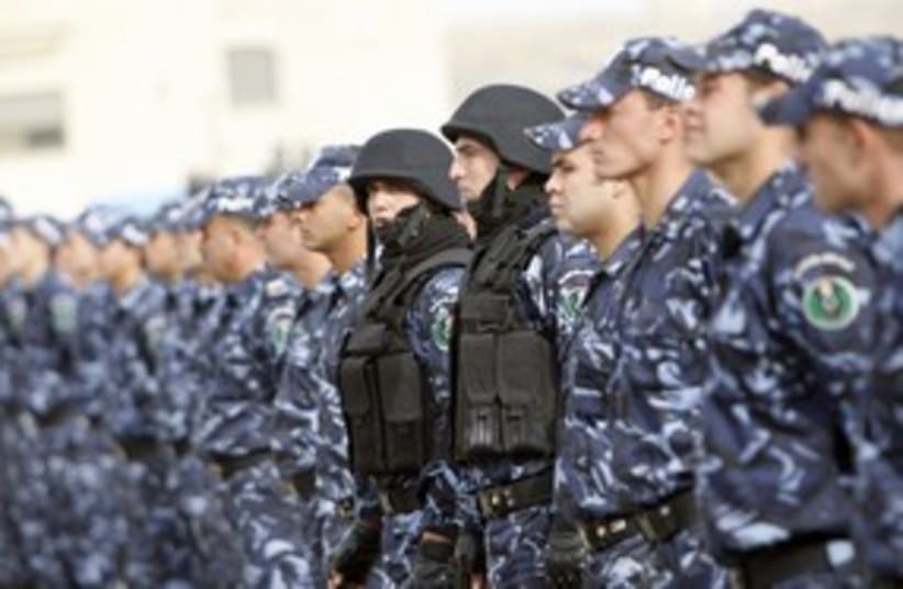 Palestinian Authority police 311 (R) (photo credit: Mohamad Torokman / Reuters)