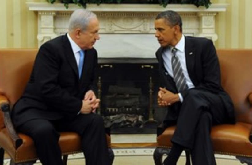 PM Netanyahu sitting with US President Obama 311 (photo credit: Avi Ohayon / GPO)