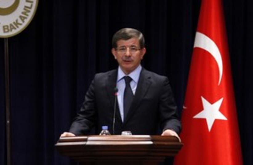 Turkish Foreign Minister Ahmet Davutoglu 311 (R) (photo credit: REUTERS/Umit Bektas)