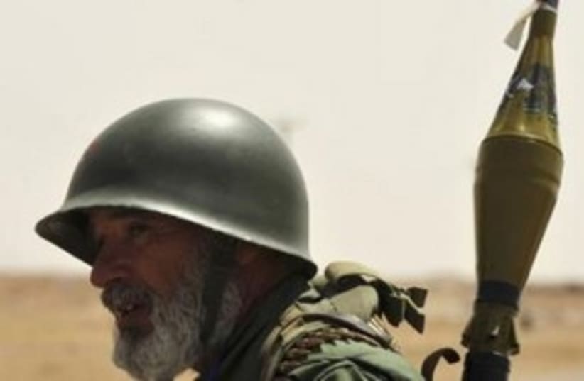 Libyan rebel with RPG 311 (R) (photo credit: REUTERS/Esam al-Fetori)