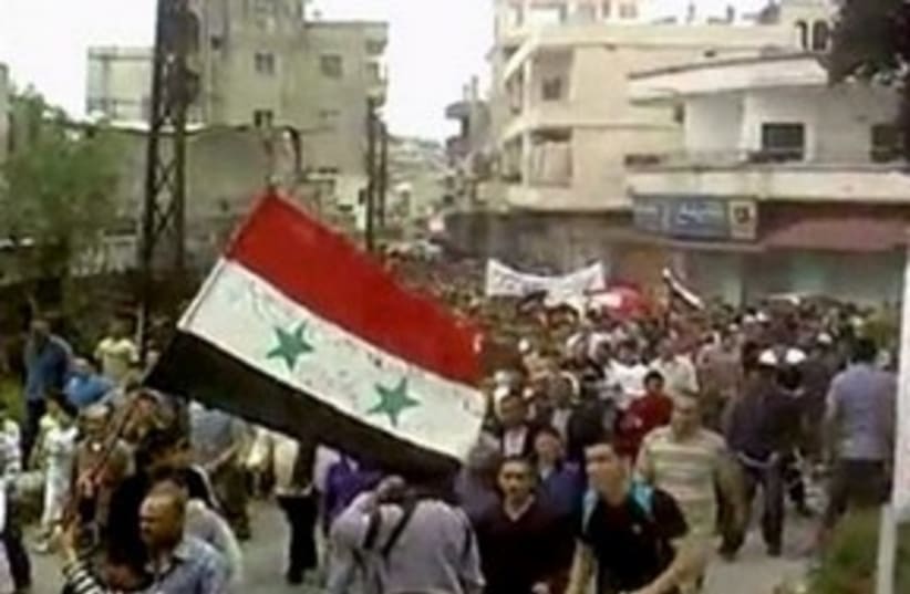 Syria Protest Homs 311 (photo credit: Reuters)
