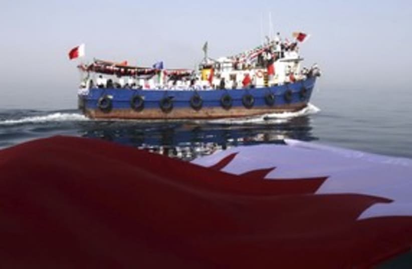 Bahrain flag and boat 311R  (photo credit: Reuters)