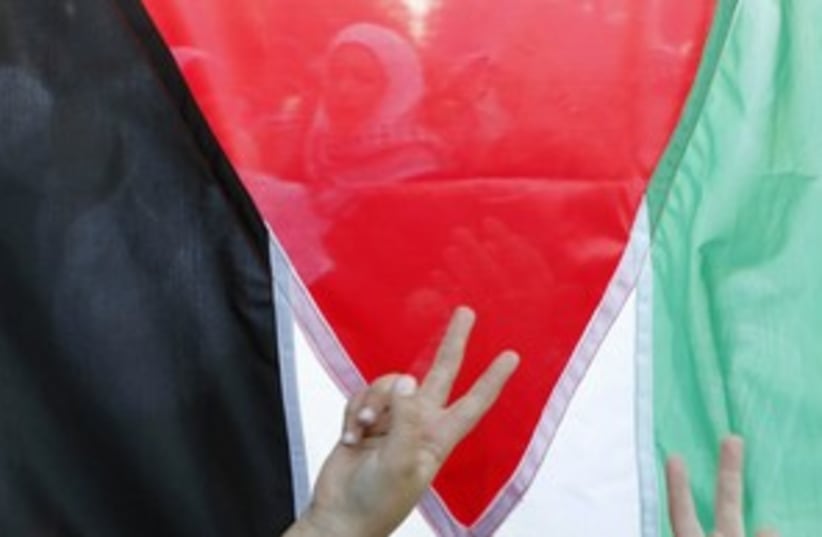 palestinian flag_311 (photo credit: REUTERS/Ali Jarekji)