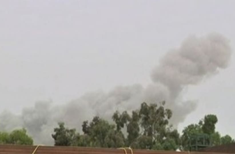 gaddafi compound blast_311 (photo credit: REUTERS)