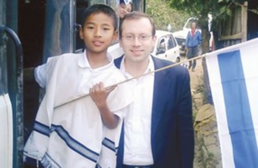 Freund with a Bnei Menashe youth in India 311 (photo credit: MICHAEL FREUND)
