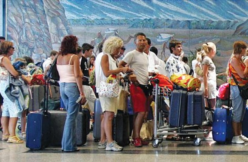 Israelis at airport 521 (photo credit: REUTERS)