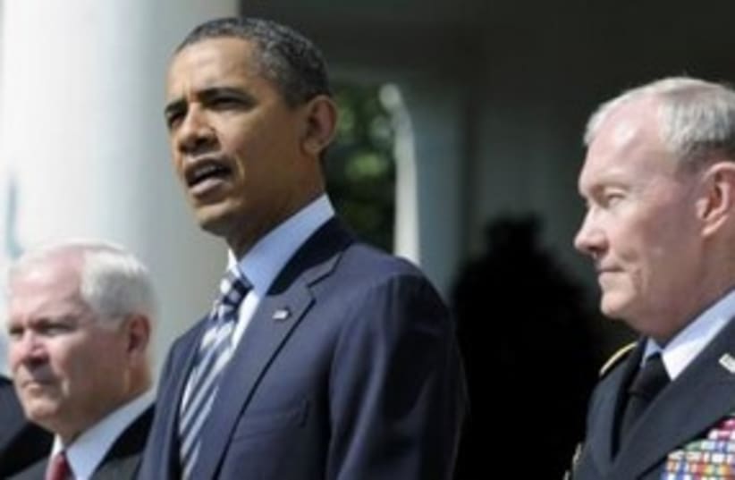 US President Obama and Robert Gates 311 (R) (photo credit: REUTERS/Jonathan Ernst )