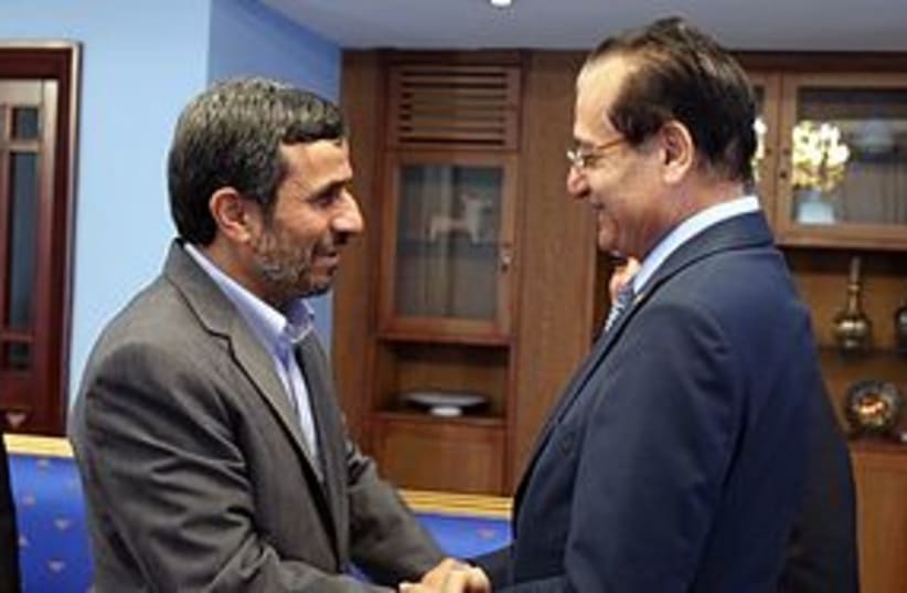 Ahmadinejad and Mansour 311 (photo credit: Press TV)