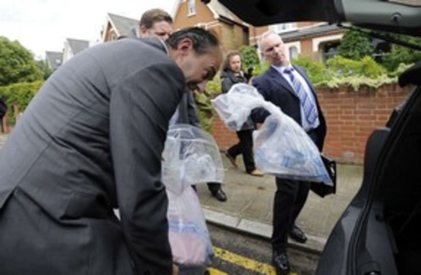uk POLICE, HOME OF HANDY COULSON_311 (photo credit: REUTERS)