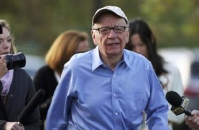 Rupert Murdoch with press 311 (photo credit: REUTERS/Anthony Bolante)