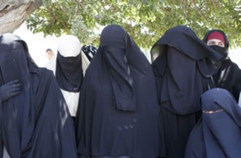 Arab Muslim veiled hijab nikab niqab mask 311 (R) (photo credit: Ali Jarekji / Reuters)