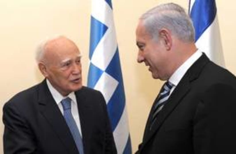 netanyahu and Papoulias_311 (photo credit: Amos Ben Gershom/GPO)