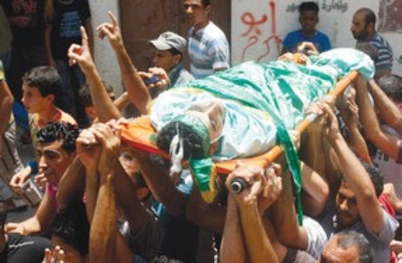 Palestinains body Nablus raid funeral_311 (photo credit: Reuters)