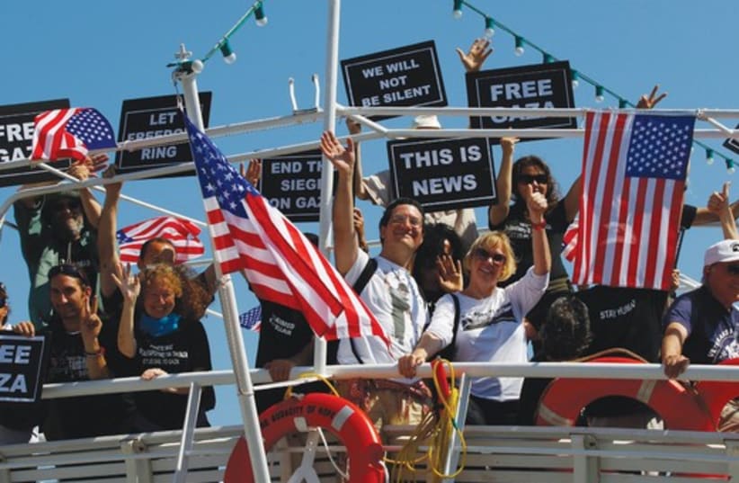 Activists on ‘The Audacity of Hope’ at Perama port 521 (photo credit: Reuters)
