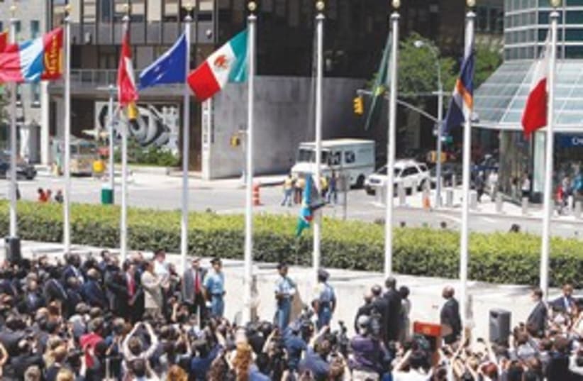 THE FLAG of South Sudan is raised in front of the UN head311 (photo credit: REUTERS)