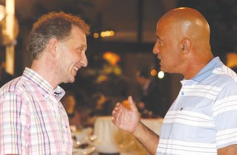 David Horovitz and ‘Jerusalem Post’ owner Eli Azur (photo credit: Marc Israel Sellem)