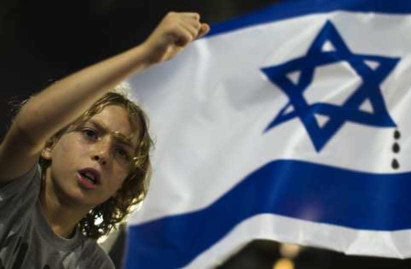 Tel Aviv protests flag 521 (photo credit: REUTERS/Amir Cohen)