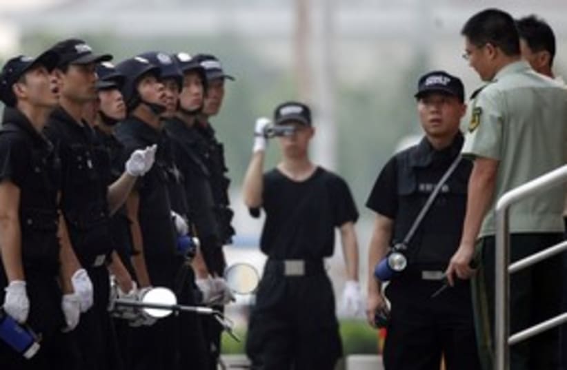 chinese police generic 311 R (photo credit: REUTERS/Carlos Barria)