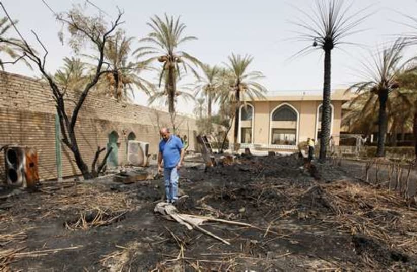 Rocket attack aftermath in Baghdad 521 (photo credit: REUTERS/Mohammed Ameen)