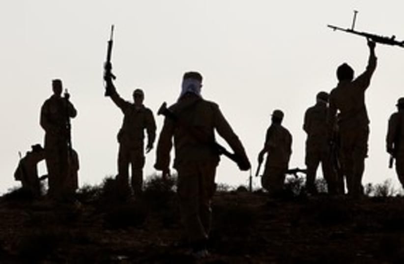 Libyan rebels during training exercise 311 (R) (photo credit: REUTERS/Bob Strong)