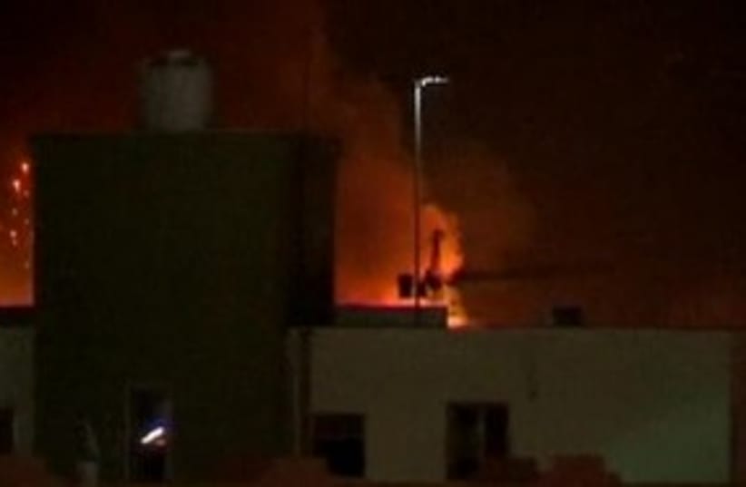 Tripoli rocked by explosions (photo credit: REUTERS)