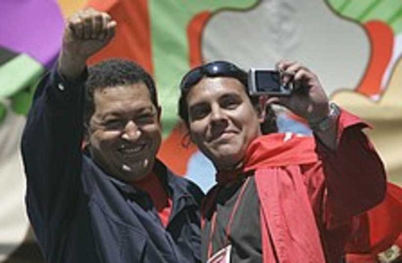 Chavez salutes 224.88 (photo credit: AP)